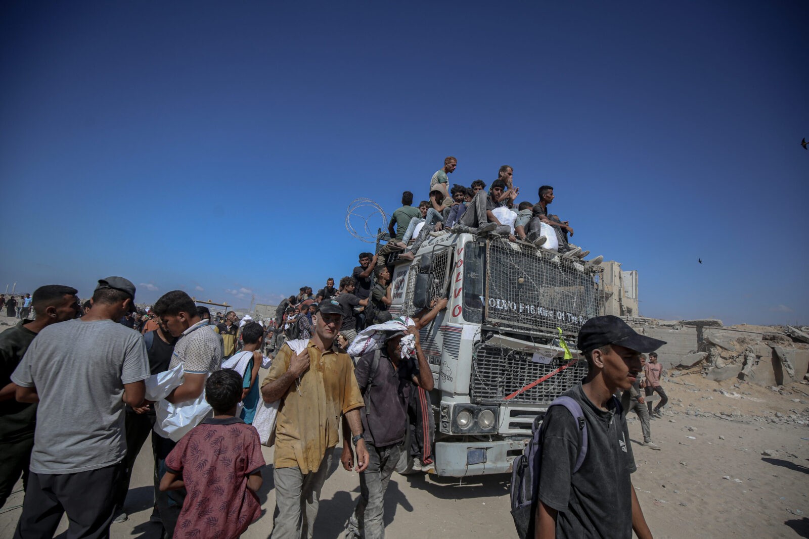 Gaza Aid Truck Overturns on Crowd Killing 25 Gaza Aid Truck Overturns on Crowd Killing 20 - The State Signal